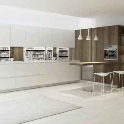 Cucina di design ad angolo con penisola in laccato bianco lucido e legno di Miton